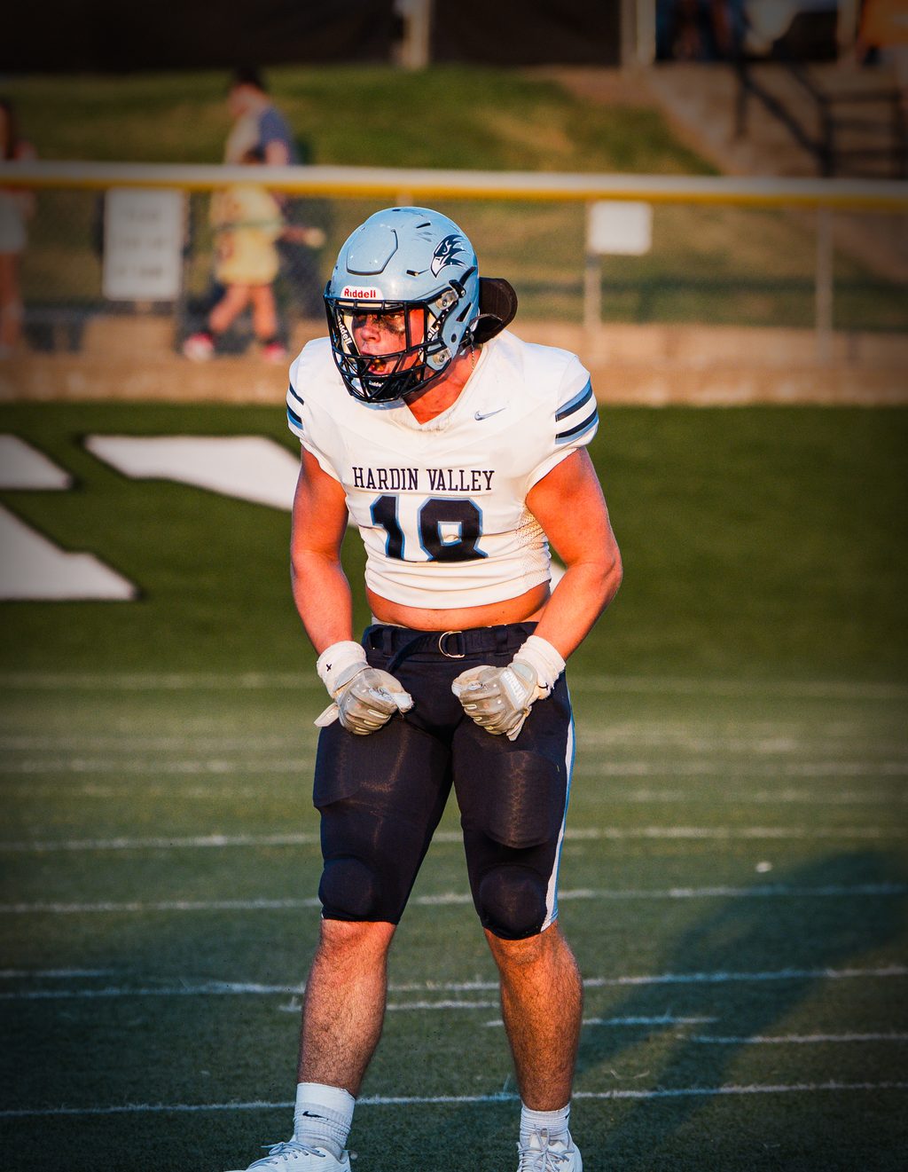 Player standing at the sideline before play
